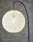 Homeroots Lighting Delilah Rattan Groovy String Floor Lamp with Metal Arc